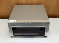COLLECTION ONLY: A pre-owned DNP DS40 photo printer (Some cosmetic damage).