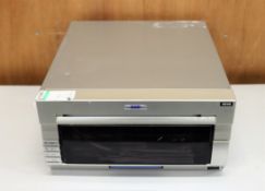 COLLECTION ONLY: A pre-owned DNP DS40 photo printer (Some cosmetic damage).