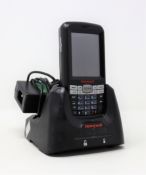A pre-owned Honeywell Dolphin 60s Mobile Computer Barcode Scanner with cradle and power supply.