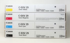 Eight boxed as new Canon toner cartridges.