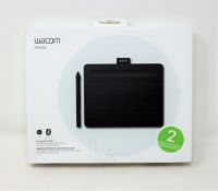 A boxed as new Wacom Intuos creative pen tablet in black(PN:CTL-4100WL/K0-BX) (box damaged)