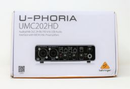 A boxed as new Behringer U-PHORIA UMC202HD USB Audio Interface (Box sealed, some damage to box).
