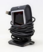 A pre-owned Honeywell Genesis 7580G-2 1D 2D USB Presentation Barcode Scanner.