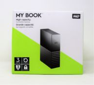 A boxed as new Western Digital 3TB My Book external desktop hard drive in black.