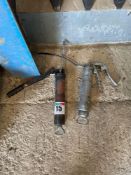 Pair grease guns