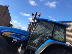 Bespoke glass protectors for New Holland TM tractor. Stored near Bungay, Suffolk.