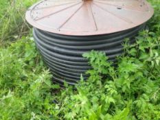 2 Ex irrigator pipe drums with pipe. Stored near Harleston, Norfolk.