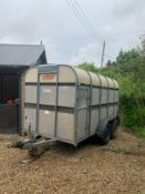 Bateson 1999 tandem axle livestock trailer, good tyres, solid metal floor.