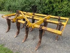 Bomford chisel plough cultivator. Stored near St Neots, Cambridgeshire.