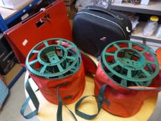 *Small Black Case, Red Bag, and Two Christmas Ligh