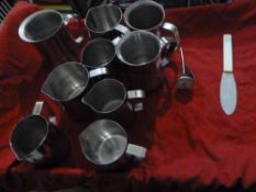 * 9 x milk heating jugs, milk spatula and milk thermometer