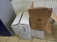 *Four Boxes Containing Toilet Tissue and Hand Towels