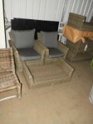 *Pair of Rattan Easy Chairs and Occasional Table