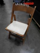 *Plastic Crate Containing 24 Folding Beech Chair with Cream Vinyl Seat Pad