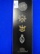 Four Cap Badges and Unidentified Medallion/Badge