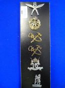Six Army Cap Badges