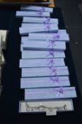 Sixteen Boxed Charm Bracelets