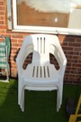 Three White Plastic Garden Chairs