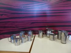 * coffee machine accessories milk steaming jugs, choc shakers, etc