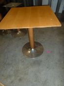 * 4 x square tables S/S square pedestal bases with wooden vaner tops. 680w x 680d x 760h