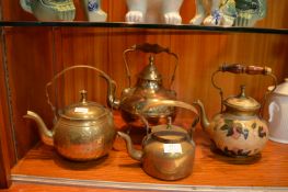 Four Brass Kettles