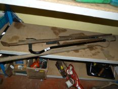 Walking Stick and Tools Including Hoe, Slasher, Roofing Tool, and a Crowbar