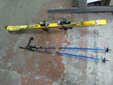 Pair of Salomon Skis with Locust Poles