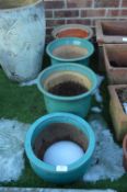 Four Turquoise Glazed Planters