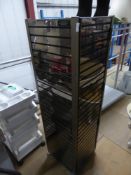 * mirrored display cupboard on castors with hanging accessories