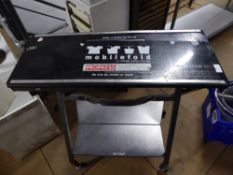 * mobile fold by customer minded clothes folding table