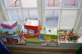 *Quantity of Board Games; Hangman, Monopoly Junior, Magnetic Word Strips, and a Quantity of Plastic