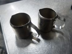 * S/S milk jugs x approx. 80