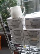 * boxed stump tea pots x 3