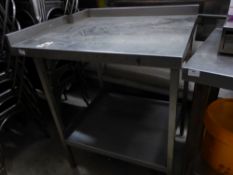 *S/S prep bench with upstand to right and rear (with small cut out) and under shelf. 850w x 700d x 9
