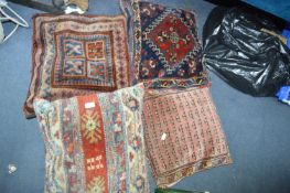 Four Eastern Rug Style Cushions