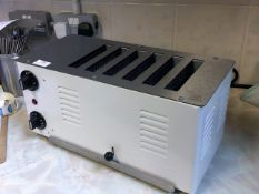 *Rowlett 6 slice white and S/S toaster