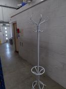 * white metal coat stand