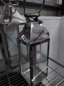 * S/S lantern. 180w x 180d x 550h. Missing 2 glass panels