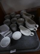 * selection of assorted ramekins and sauce boats