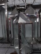 * S/S lantern. 180w x 180d x 550h.