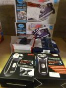 *Two Steam Irons, Plug In Heater, and Three Electr