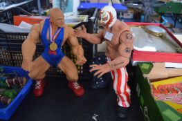 Two WWE Wrestling Figures