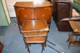 Bow Front Sideboard and a Nest of Three Tables