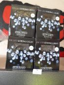 *Four 100 LED String Lights