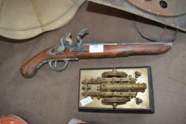 Reproduction Flintlock Pistol plus a Model Canon