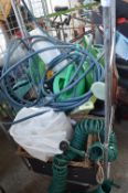 Cage of Garden Watering Cans, Hose Pipes, Fleece T