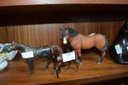 Three Horse Figures