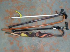 Umbrella, Walking Sticks and a Litter Picker