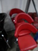 * 3 x red leather Elizabeth Arden gas lift chairs with chrome bases. Seat height from 500-800