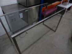 * glass top table with brushed steel frame. 1500w x 650d x 920h